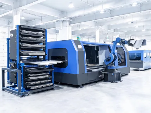 Automated material tower feeding a fiber laser cutting cell